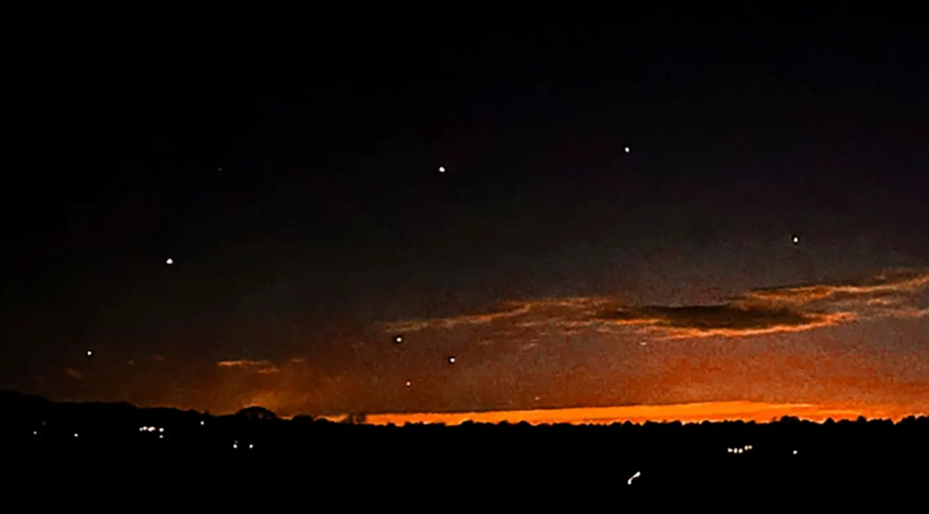 Lights appear in the night sky in Lebanon Township, N.J., on Dec. 5, 2024. (Trisha Bushey via AP) Associated Press